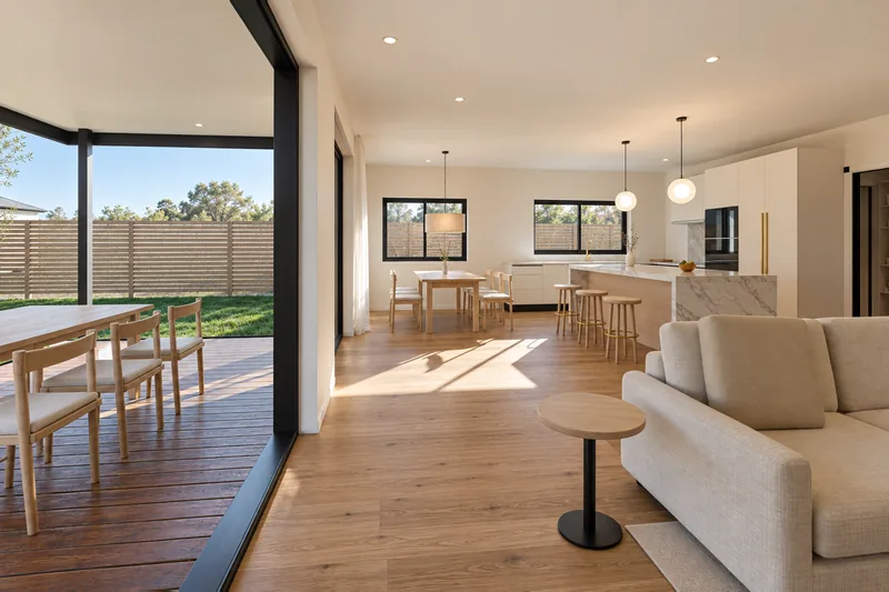 Dining by the kitchen, with the glass doors to the deck